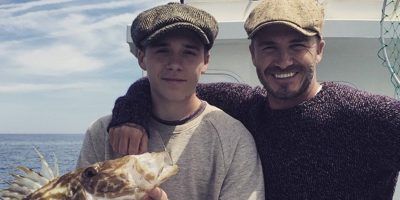 David and Brooklyn Beckham go sea fishing 2015.jpg